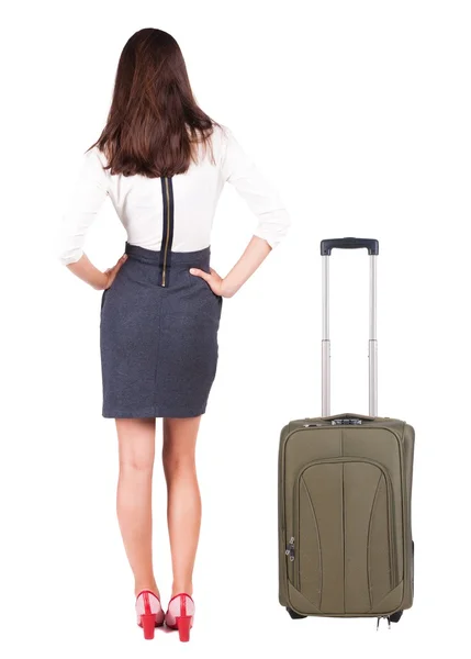 Arkadan görünüş iş kadını ile bavul seyahat. — Stok fotoğraf