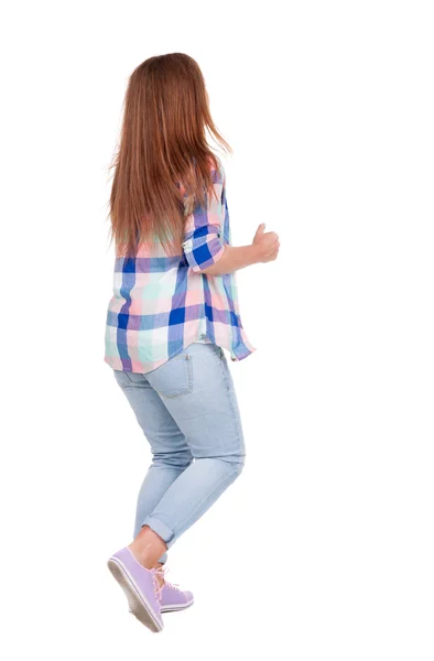 Achteraanzicht van lopende vrouw. — Stockfoto