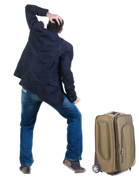 Olha jovem perito itinerante com suitcas — Fotografia de Stock