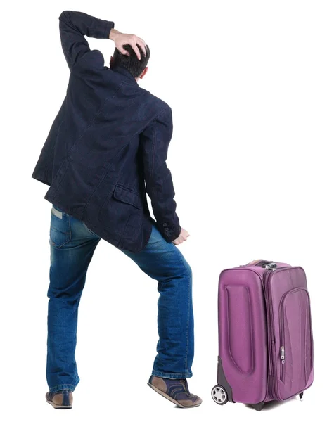 Jung-Reisen-Experte mit Suitcas sieht voraus — Stockfoto