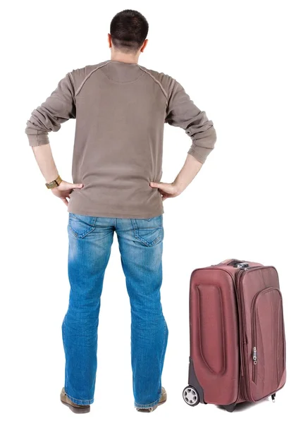 Reisen jungen Mann mit Koffer — Stockfoto