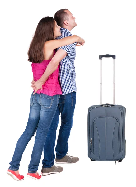 Jovem casal viajando com suitcas — Fotografia de Stock