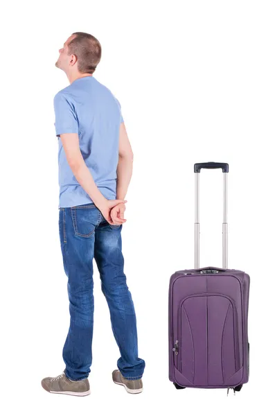 Νεαρός άνδρας που ταξιδεύουν με suitcas — Φωτογραφία Αρχείου