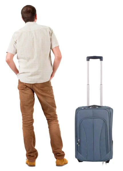 Jeune homme voyageant avec suitcas — Photo