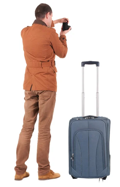 Man photographing traveling with suitcase — Stock Photo, Image