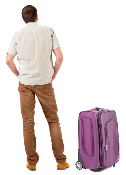 Joven viajando con suitcas — Foto de Stock