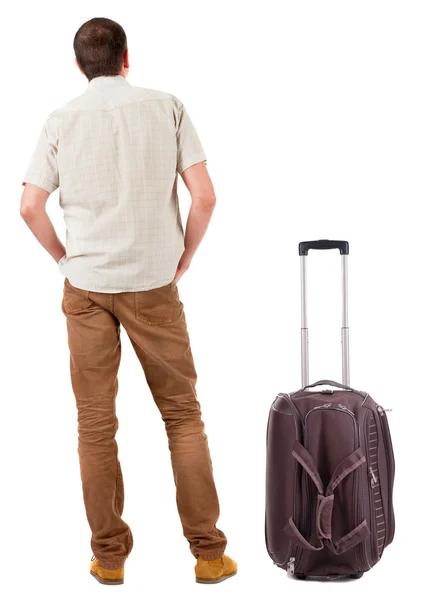 Joven viajando con suitcas — Foto de Stock