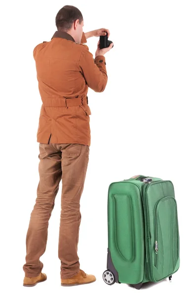 Man photographing traveling with suitcase — Stock Photo, Image