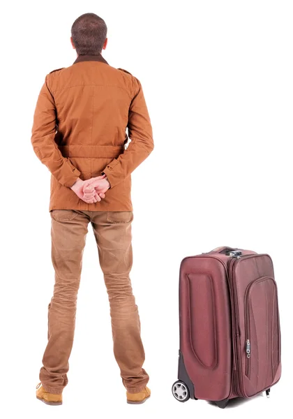 Young man traveling with suitcase — Stock Photo, Image