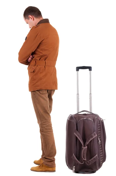 Jeune homme voyageant avec valise — Photo