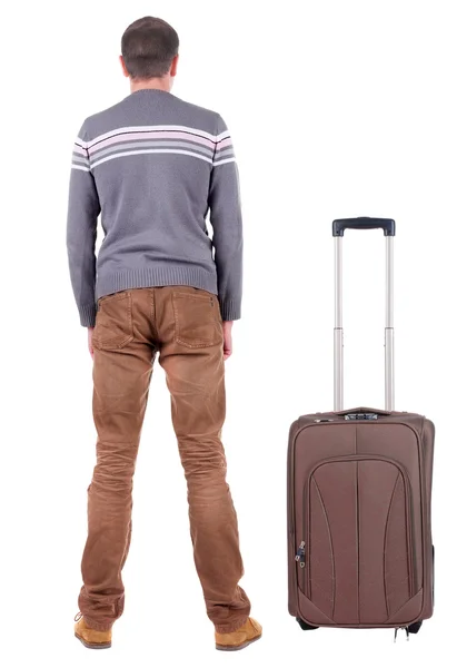 Jeune homme voyageant avec valise — Photo