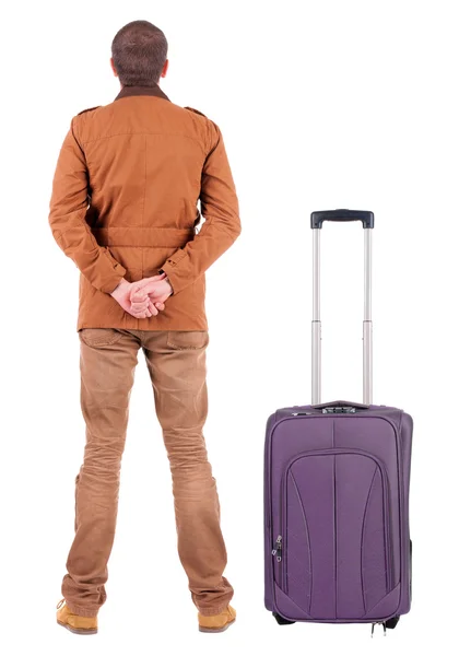 Jeune homme voyageant avec suitcas — Photo