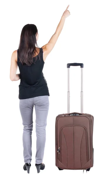 Young brunette woman traveling with suitcas — Stock Photo, Image