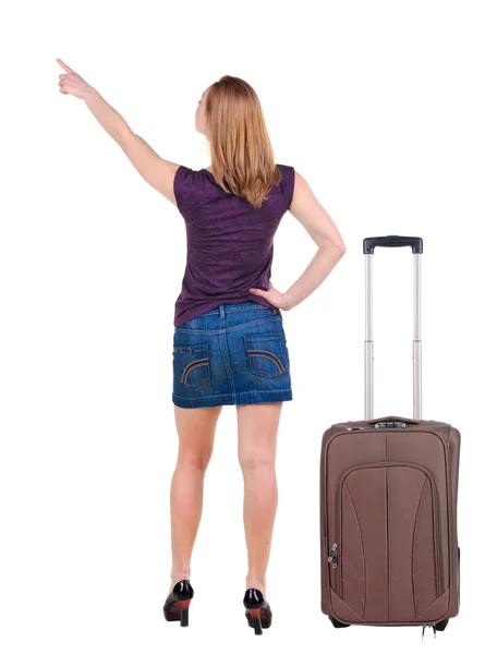 Mulher jovem e bonita no vestido viajando com suitcas e ponto — Fotografia de Stock