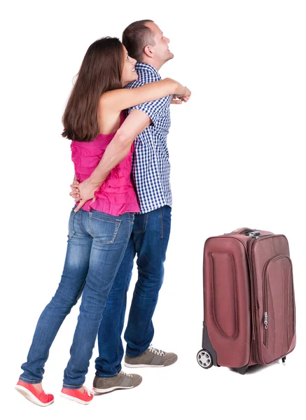 后视图和手提箱旅行对年轻的夫妇. — 图库照片