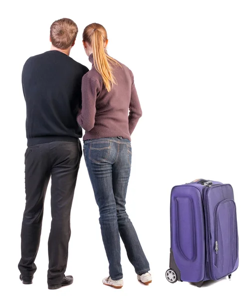 Fiatal pár, bőrönd utazótáska hátulnézete — Stock Fotó