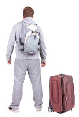 arkadan görünüşü ile bavul seyahat genç adam.