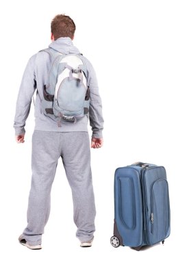 arkadan görünüşü ile bavul seyahat genç adam.