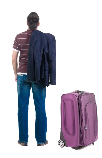 젊은 남자 가방 여행 앞서 보인다. 후면 보기. — 스톡 사진