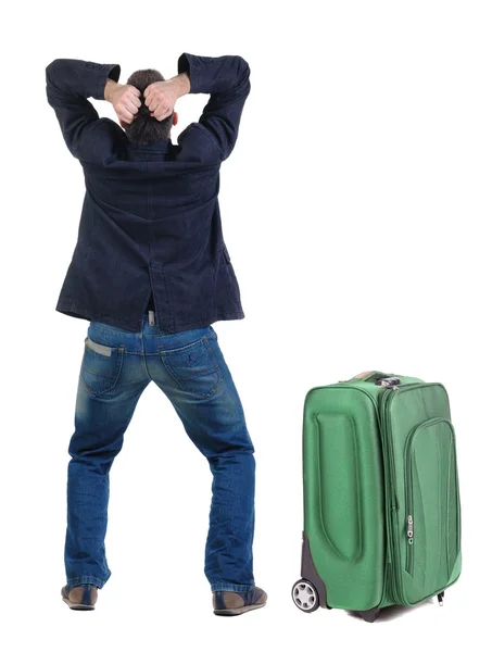 Angry Young Man Reisen mit Koffer — Stockfoto