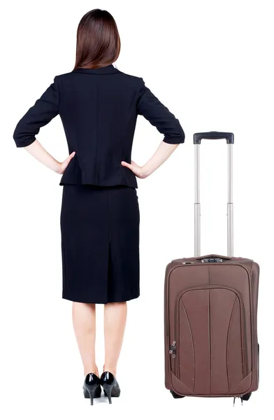 Rückansicht des durchdachten Business-Frau, die Reisen mit Koffer. — Stockfoto