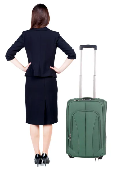 Vista posterior de la mujer de negocios considerado viajando con maleta. — Foto de Stock