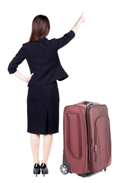 Arkadan görünüşü ile bavul seyahat genç esmer iş kadını — Stok fotoğraf