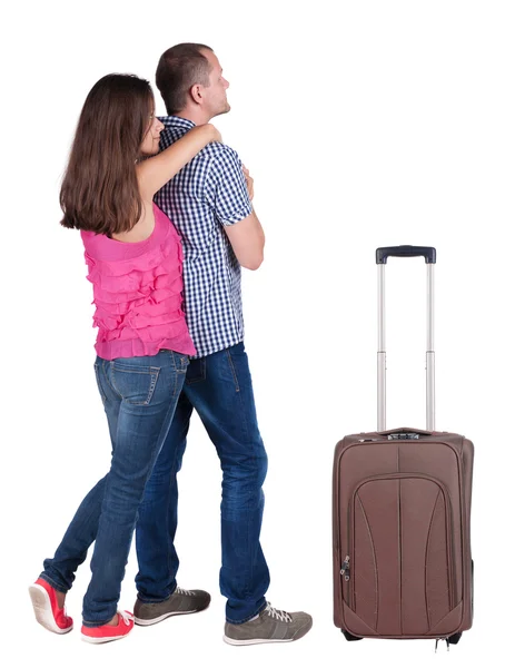 Vista do jovem casal viajar com mala traseira. — Fotografia de Stock