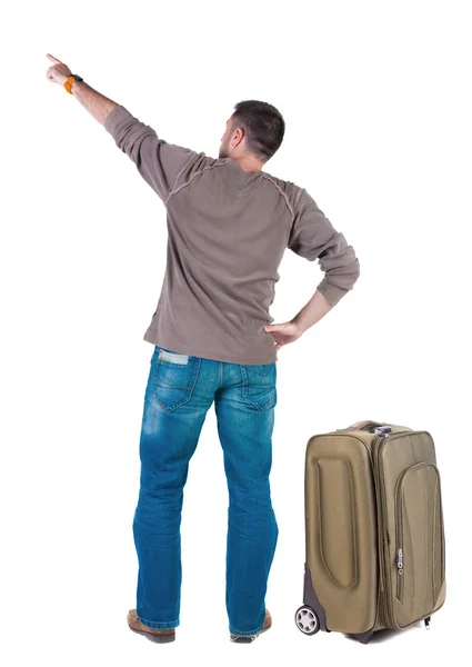 Pohled zezadu na polohovací mladí muži cestují s kufrem . — Stock fotografie