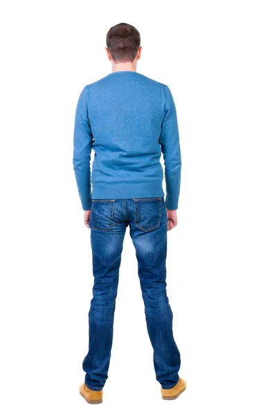 Back view of handsome man in blue pullover looking up. — Stock Photo, Image