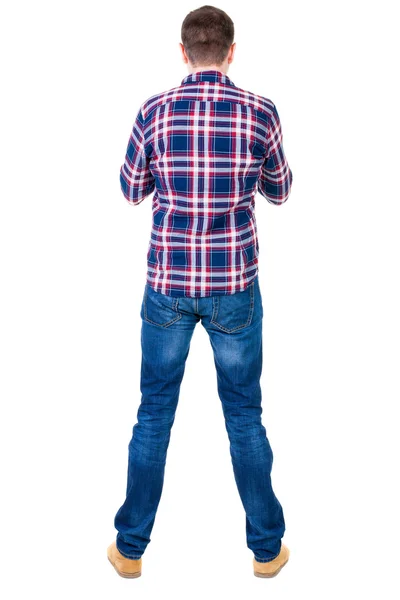 Vista posterior de hombre guapo en camisa a cuadros mirando hacia arriba. — Foto de Stock