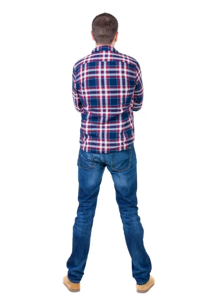 市松模様のシャツ探してでハンサムな男の背面図. — ストック写真