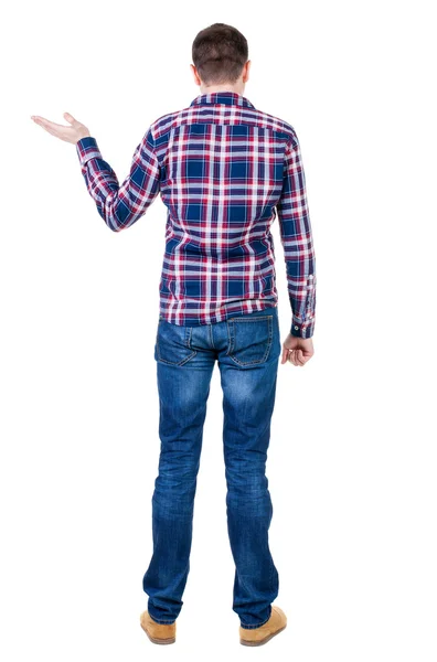 Zadní pohled pohledný muž v kostkované košili udržet na ha — Stock fotografie