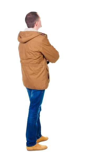 Back view of handsome man in winter parka looking — Stock Photo, Image