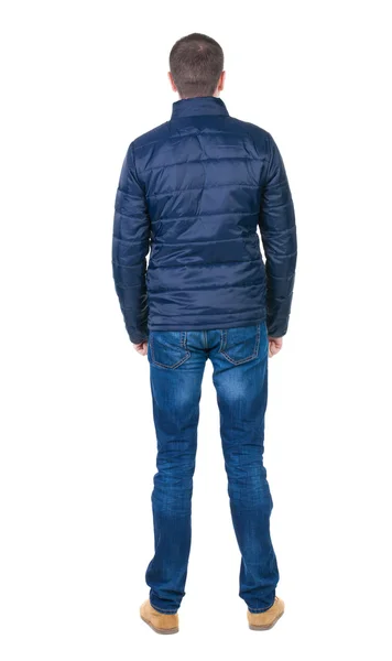 Rückansicht des gut aussehender Mann in blauer Windjacke suchen. — Stockfoto