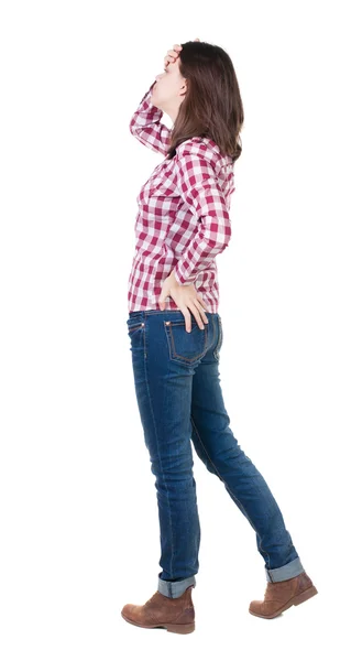 Pohled zezadu na šokovaná žena v kostkované košili — Stock fotografie