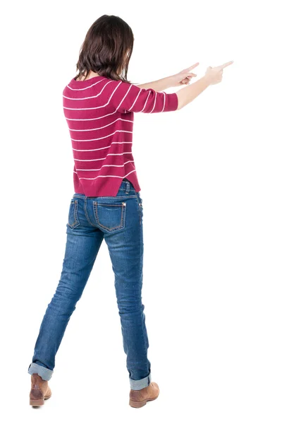 Back view of pointing woman. — Stock Photo, Image