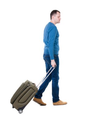 bavul ile yürüyen adam