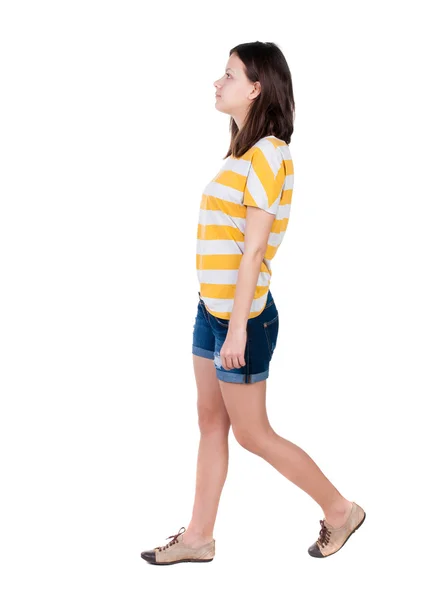 Chodící žena na bílém pozadí — Stock fotografie
