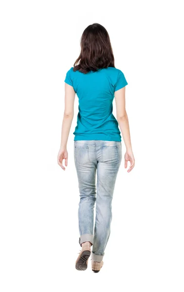 Walking woman in jeans — Stock Photo, Image