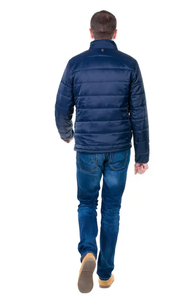 Man in jeans en jas — Stockfoto