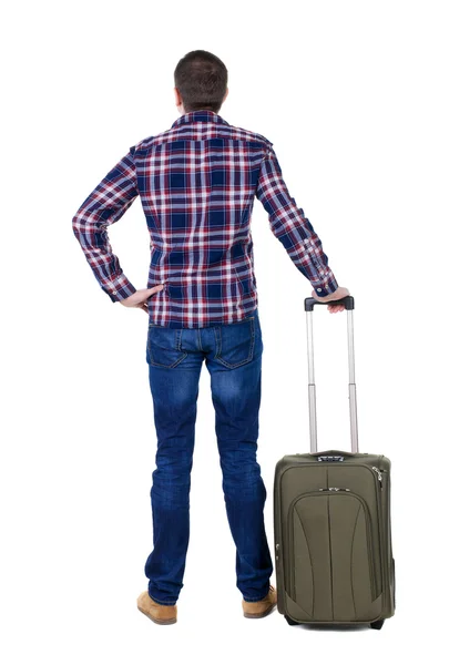 Mann mit grünen Koffer nachschlagen — Stockfoto