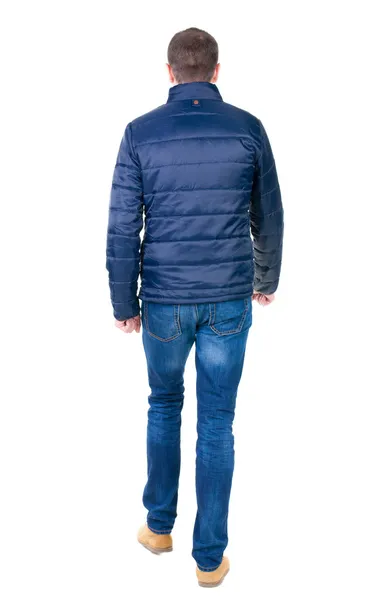 Går man i jeans och jacka — Stockfoto