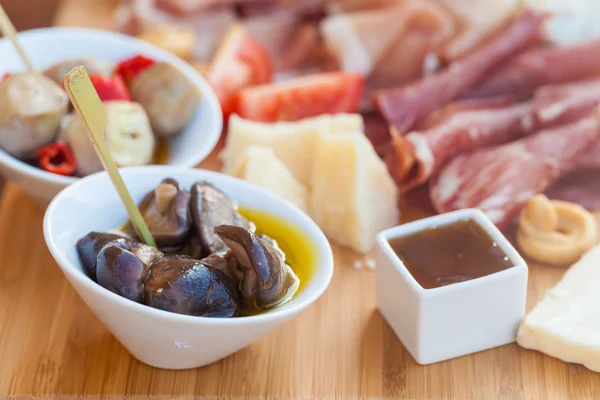 Italian food on chopping board — Stock Photo, Image