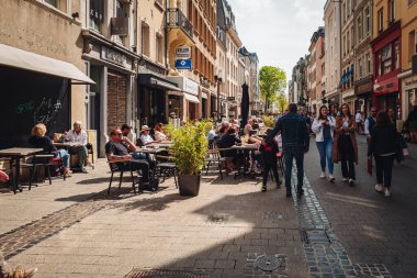 LUXEMBOURG, MAY 2022: Poeple enjying bars and terraces on a sunny day in the city center