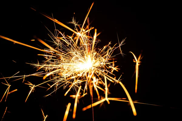 Burning christmas sparkler — Stock Photo, Image