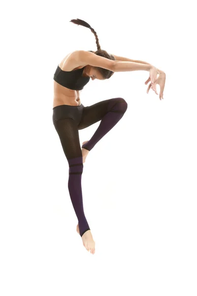 Young gymnast on a white background — Stock Photo, Image