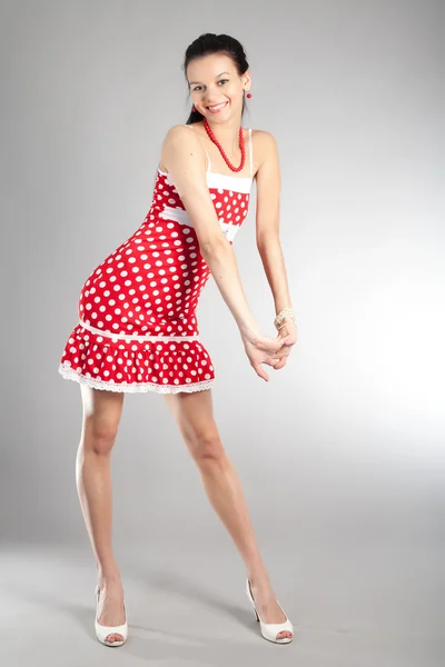 Chica atractiva en vestido rojo — Foto de Stock