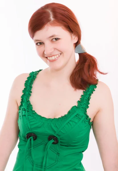 Young woman in a green dress — Stock Photo, Image