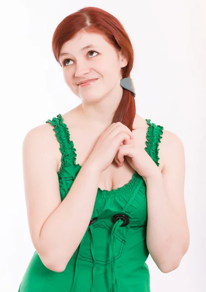 Young woman in a green dress — Stock Photo, Image